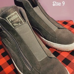 Gray and white puma suede